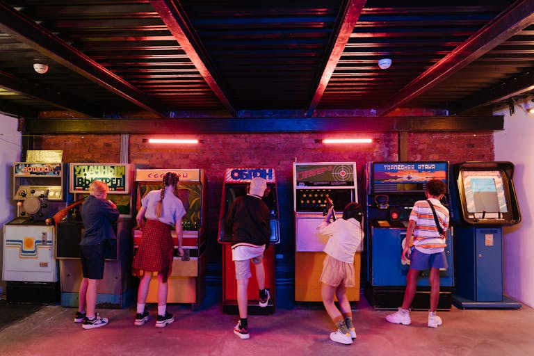 People Standing in Front of Store during Night Time